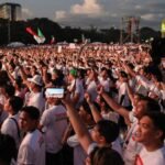Thousands from Philippine sect protest pro-Duterte senator’s looming arrest