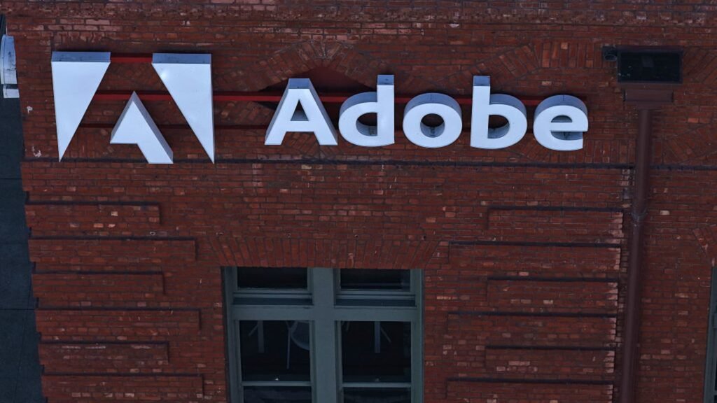 Stocks making the biggest moves midday: EchoStar, Adobe, Oracle, Intel, Sandisk & more