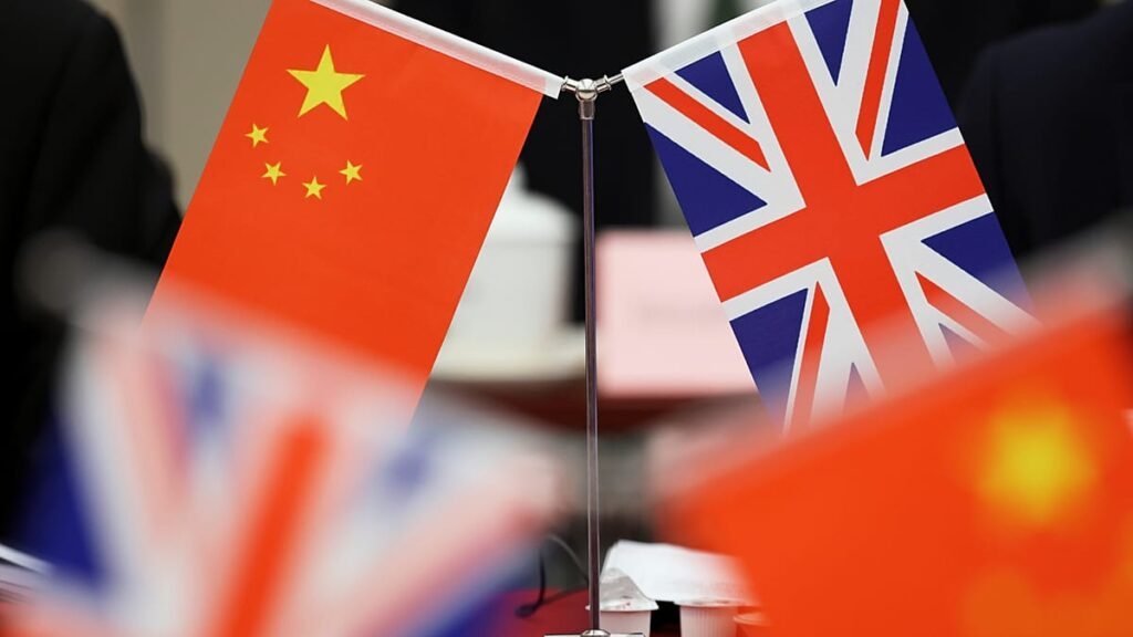 Two Chinese-British dual nationals jailed in dissident spying case