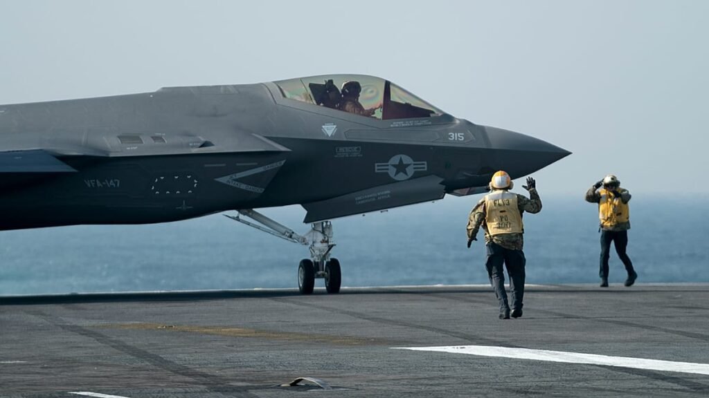 Iran threatens total halt to talks as US warplanes circle above Hormuz