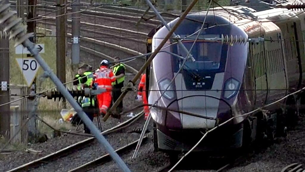 Driver dies and 33 seriously injured after two trains collide in UK