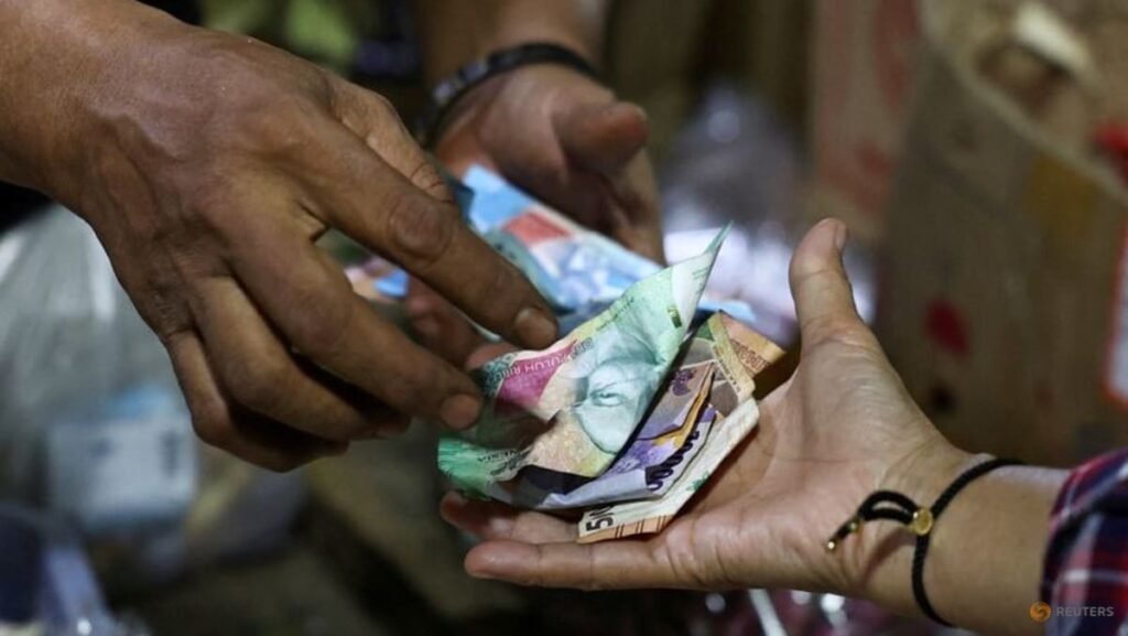 Indonesian central bank says governor briefs foreign investors following surprise rate hike