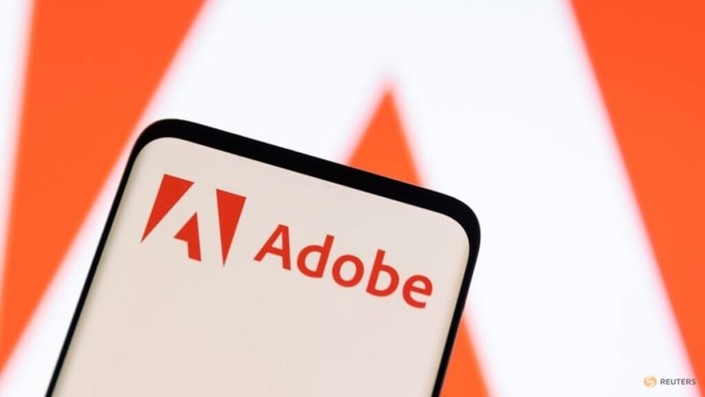 Adobe raises annual revenue forecast, CFO to exit