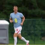 England’s Burn swaps football boots for cowboy boots during break between games