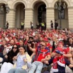 Norwegian fans take dawn World Cup party to palace gates to wake the King