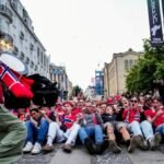 No regrets for no-row Norway fan caught sitting still on TV