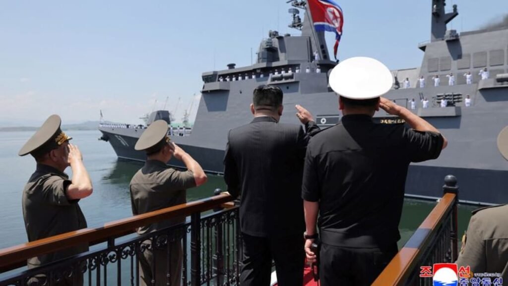 North Korea’s Kim unveils plans for 10,000-ton warships, nuclear navy