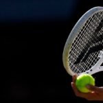 Line calling system glitch halts play at baking hot Wimbledon qualifying