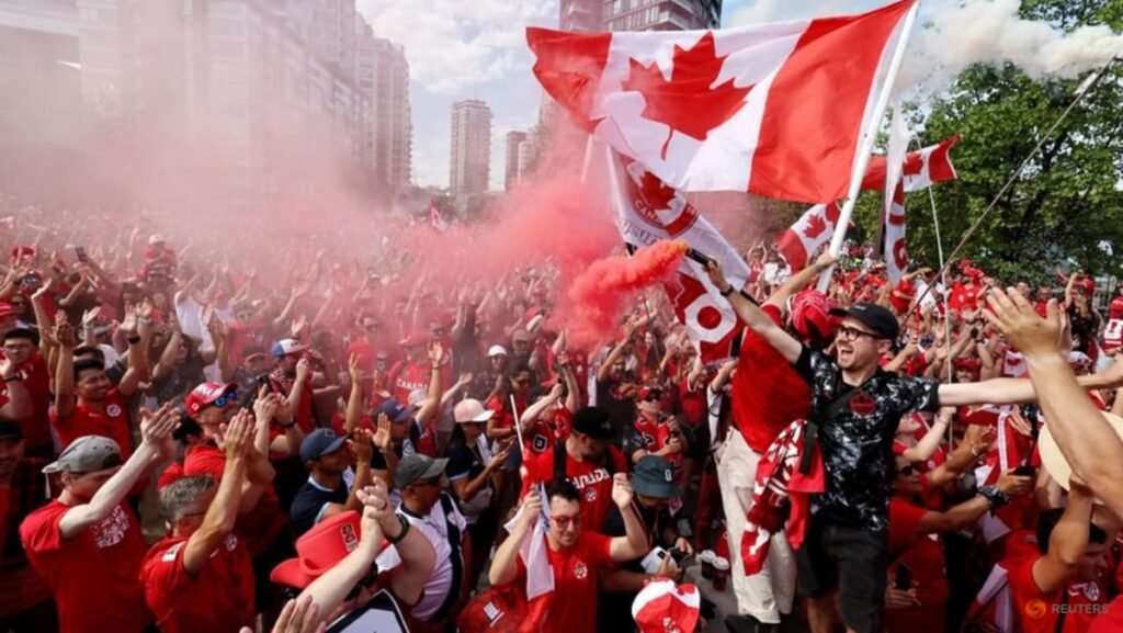 Canada fans on the march turn Vancouver into sea of red and white