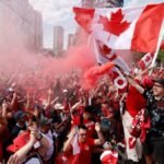 Canada fans on the march turn Vancouver into sea of red and white