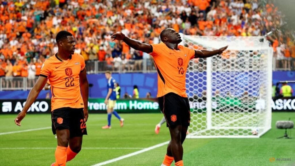 Dutch ease past Tunisia 3-1 to finish top of Group F