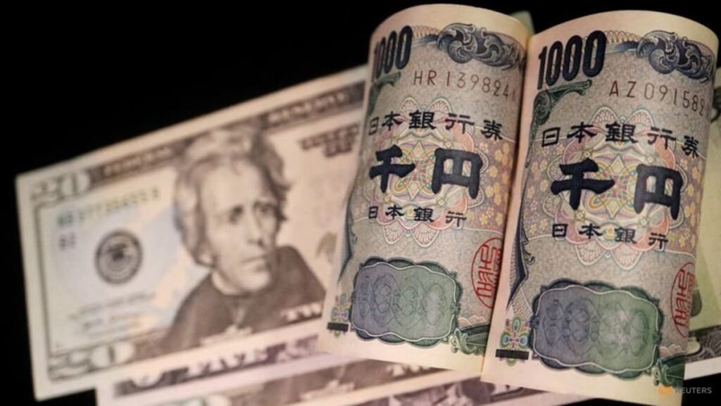 Dollar slips, yen tumbles to 40-year low