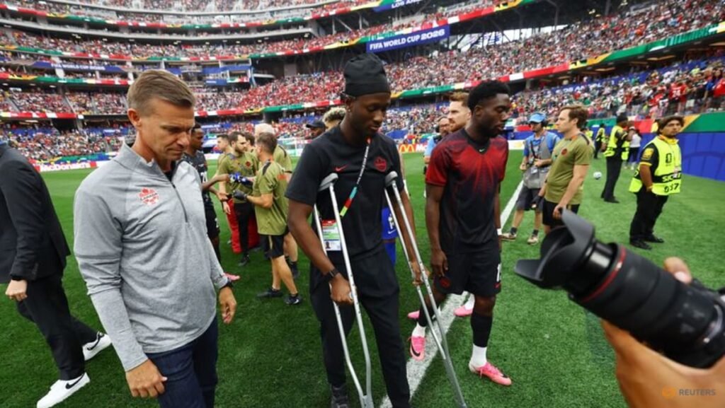 Injured Kone leads Canada celebrations after historic last-16 World Cup berth