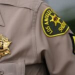 Police, firefighters proudly wear World Cup badges as they provide security