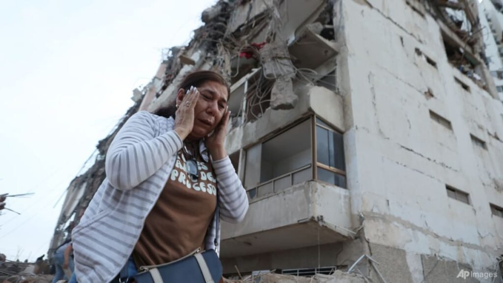 Venezuelans trapped alive after twin quakes kill at least 188