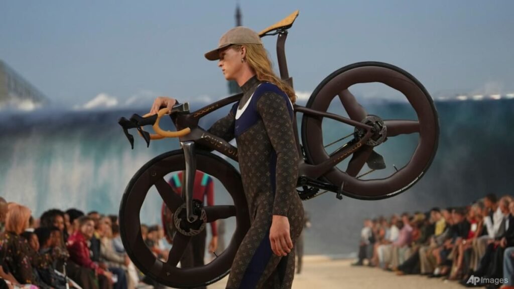 Louis Vuitton’s surfer dandy rides a giant wave at Pharrell Williams’ Paris Fashion Week show