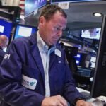 US stocks resume upward climb as dollar advances again after Fed outlook