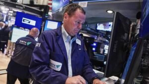 US stocks resume upward climb as dollar advances again after Fed outlook