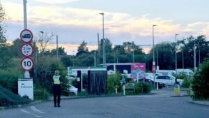 Two trains collide north of London, leaving at least one person dead, police say