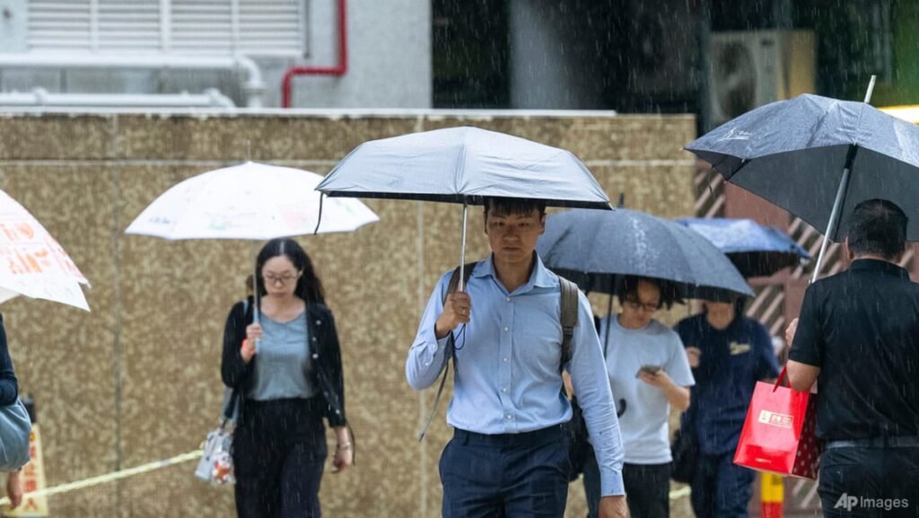 Hong Kong hoists highest rain signal, closes schools