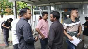 MOM investigating two firms after more than 100 migrant workers seek help over unpaid wages, housing issues