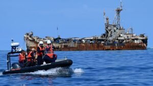 Philippine military says China injured sailor in sea clash