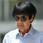 Former air force chief fined for driving into maid who was pushing toddler in stroller
