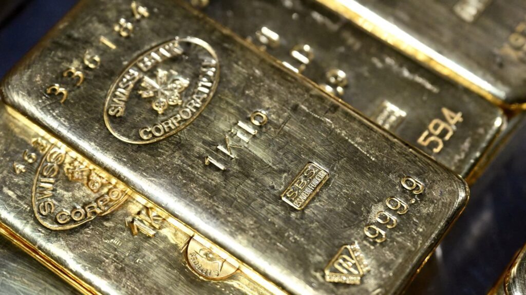 Gold prices set for first weekly rise in a month as investors scale back Fed rate hike bets
