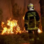 Spain and France wildfires force more than 300,000 to flee as Macron calls crisis meeting