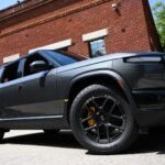 Rivian reduces 2026 spending plans, narrows earnings guidance