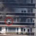 Video shows man clambering from balcony during Antwerp fire
