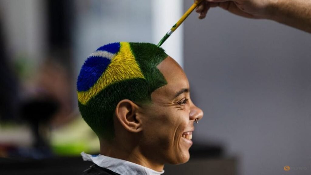 Barber shaves World Cup dreams into Brazilian fans’ hair
