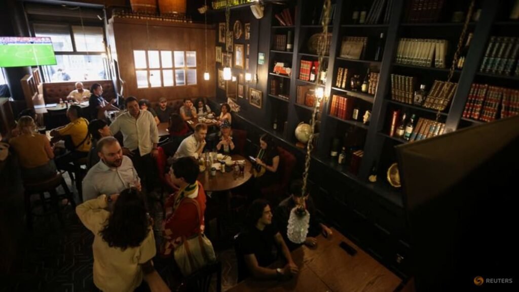 Two flags, one bar: a Mexico City pub prepares for Azteca showdown