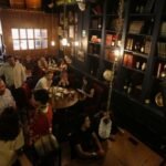 Two flags, one bar: a Mexico City pub prepares for Azteca showdown