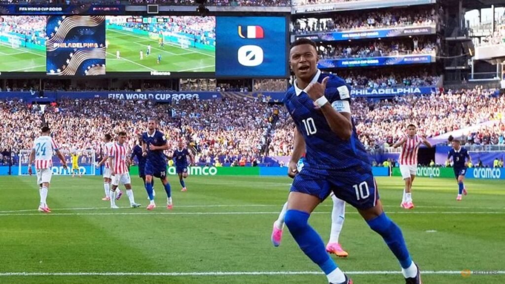 Mbappe keeps cool as France survive furnace against Paraguay