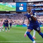 Mbappe keeps cool as France survive furnace against Paraguay
