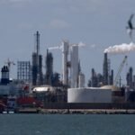 Oil prices little changed as Saudi cuts prices, OPEC+ boosts target