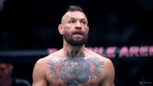 McGregor’s UFC return halted by knee injury in opening round