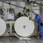 Japan manufacturers stay upbeat on chip demand, services hit by costs