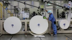 Japan manufacturers stay upbeat on chip demand, services hit by costs