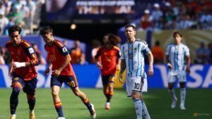 Spain battle past 10-man Argentina 1-0 in extra time to win World Cup