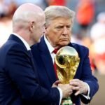 Trump lingers on stage to lap up World Cup spotlight