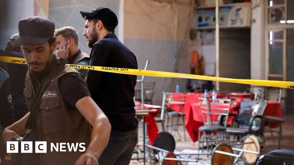 Bomb blast at central Damascus cafe kills six, state media say
