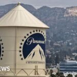 Merger deal between Paramount and Warner Bros paused by judge