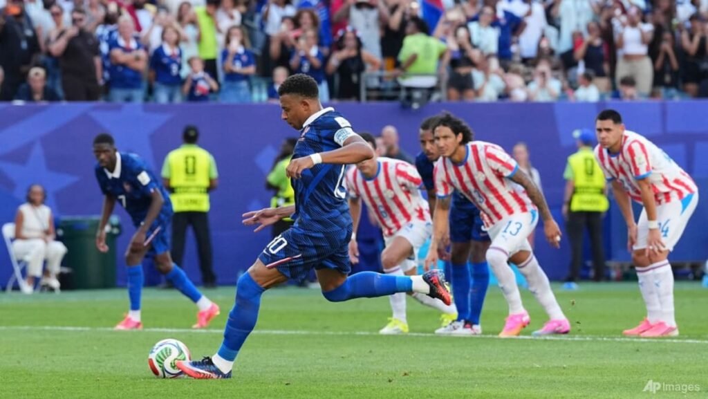 France battle past Paraguay to set up Morocco World Cup showdown