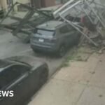Surveillance video shows the moment empty building collapses
