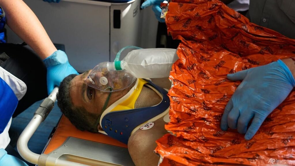 Venezuelan security guard pulled alive from building basement 8 days after twin quakes