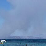 Two dead and hundreds evacuated as wildfires break out near Athens