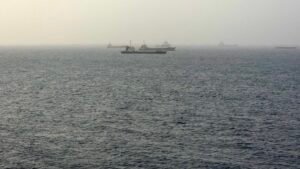 Tankers near Oman come under fire as Iran threatens to choke off shipping routes