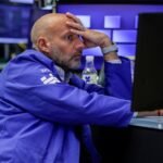 Bond yields edge higher as traders digest Treasury debt buyback plan